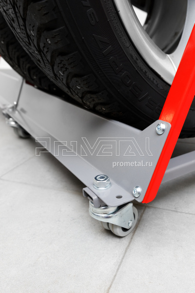 Стойка для колёс 1х4 на роликах с полкой